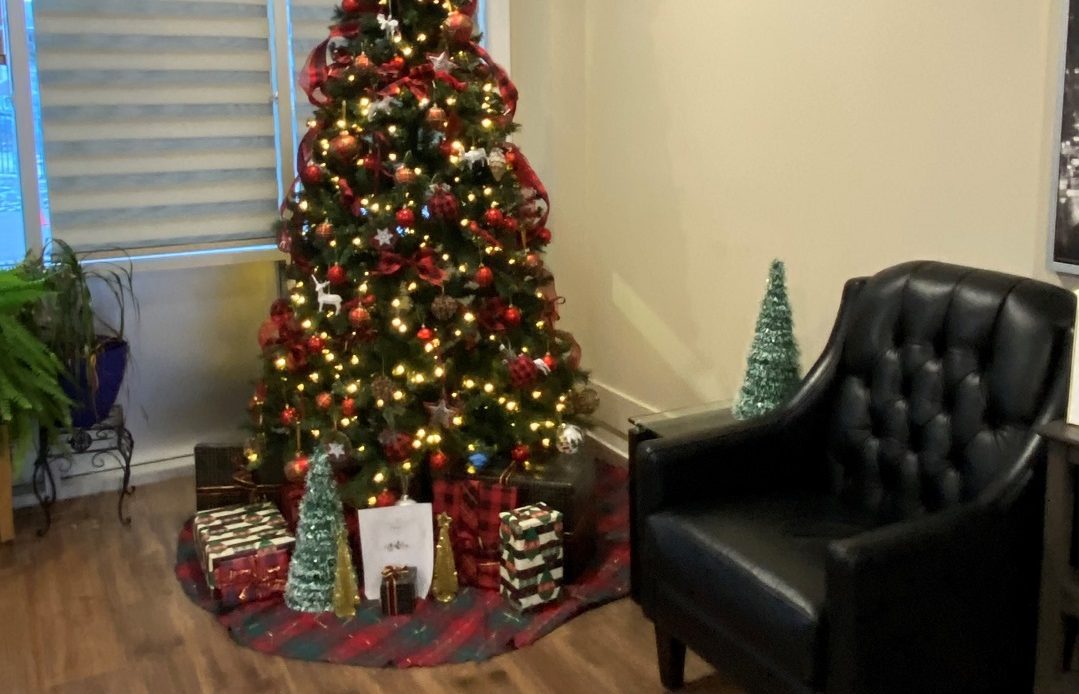 Christmas tree decorating in retirement home